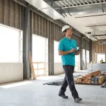 Facility manager conducting a post-construction cleaning walkthrough to estimate cost in a Durham NC building